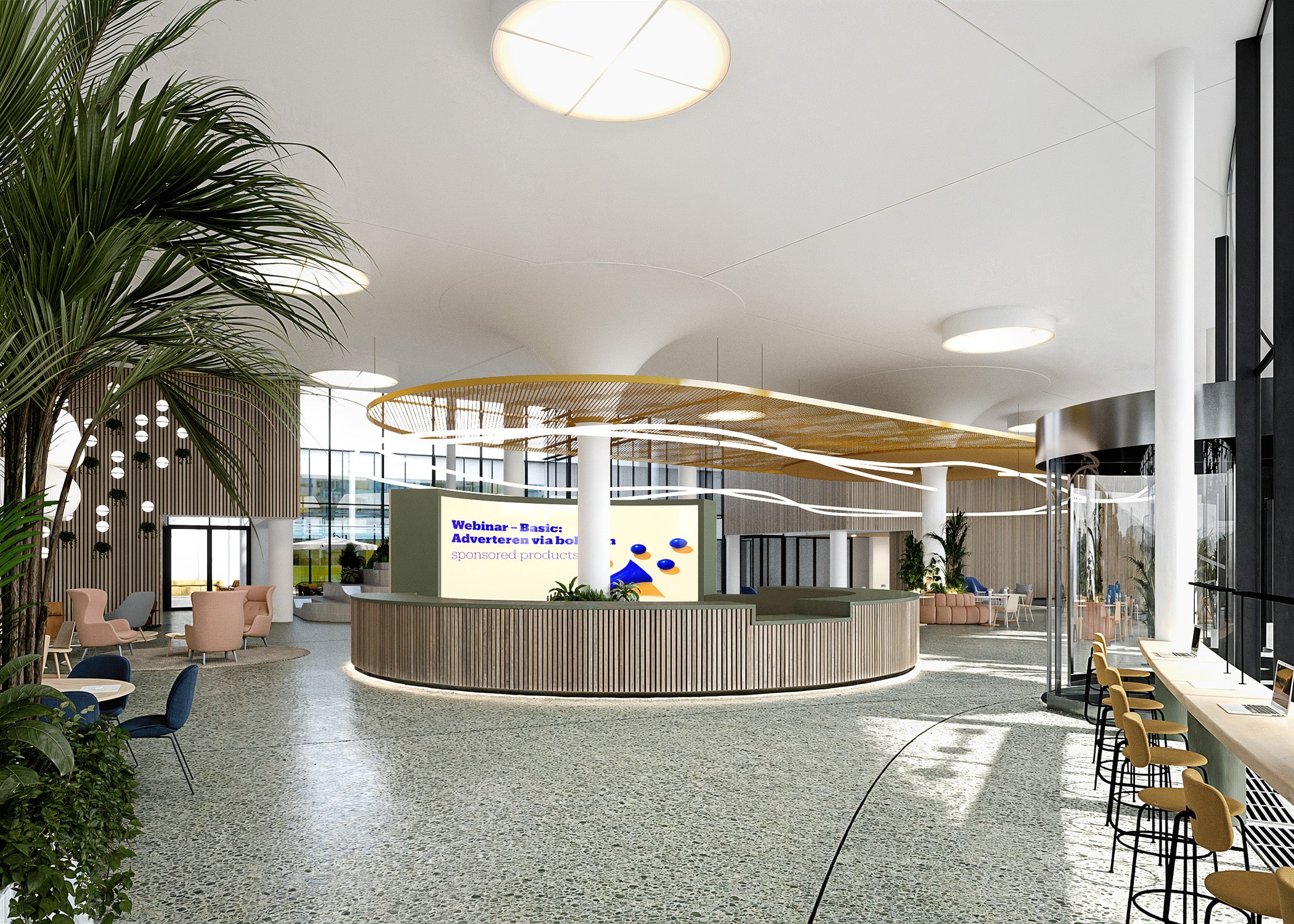 Modern lobby with large screen, circular desk, plants, and seating areas in bright natural light.